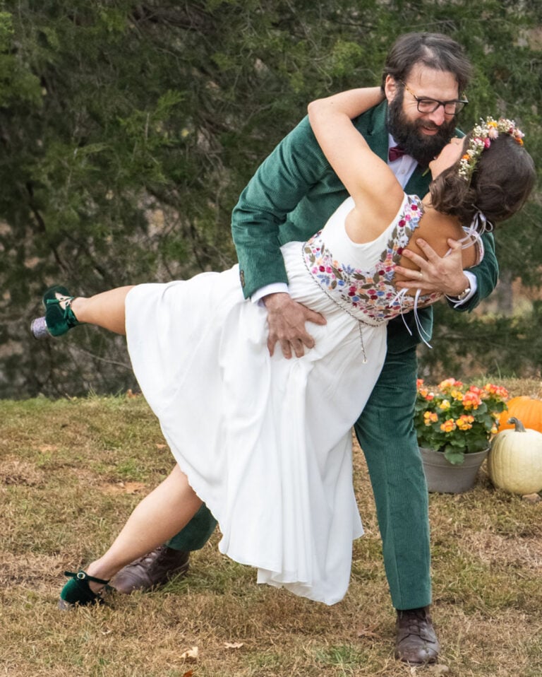 Mandy and Matt doing a dip kiss and hug