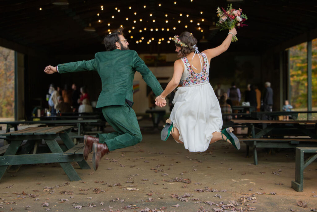 Matt and Mandy jumping for joy after getting married