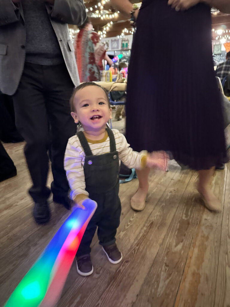 Grandson dancing with foam glow stick