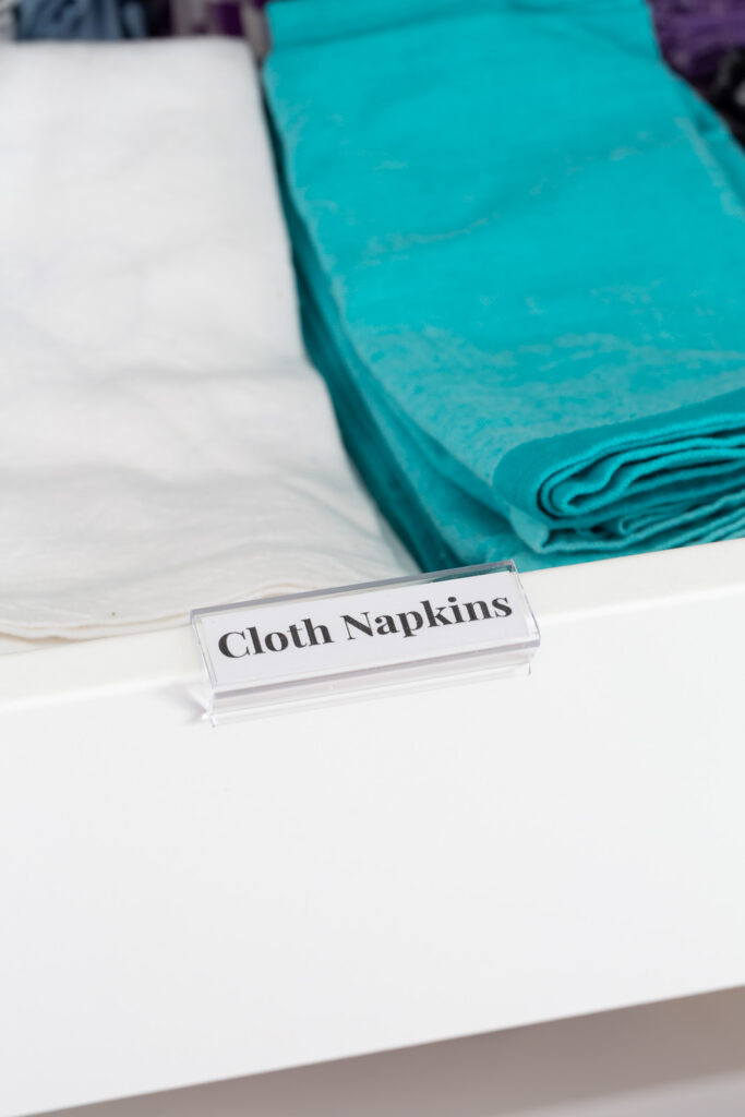 IKEA PAX with added label saying cloth napkins on drawers