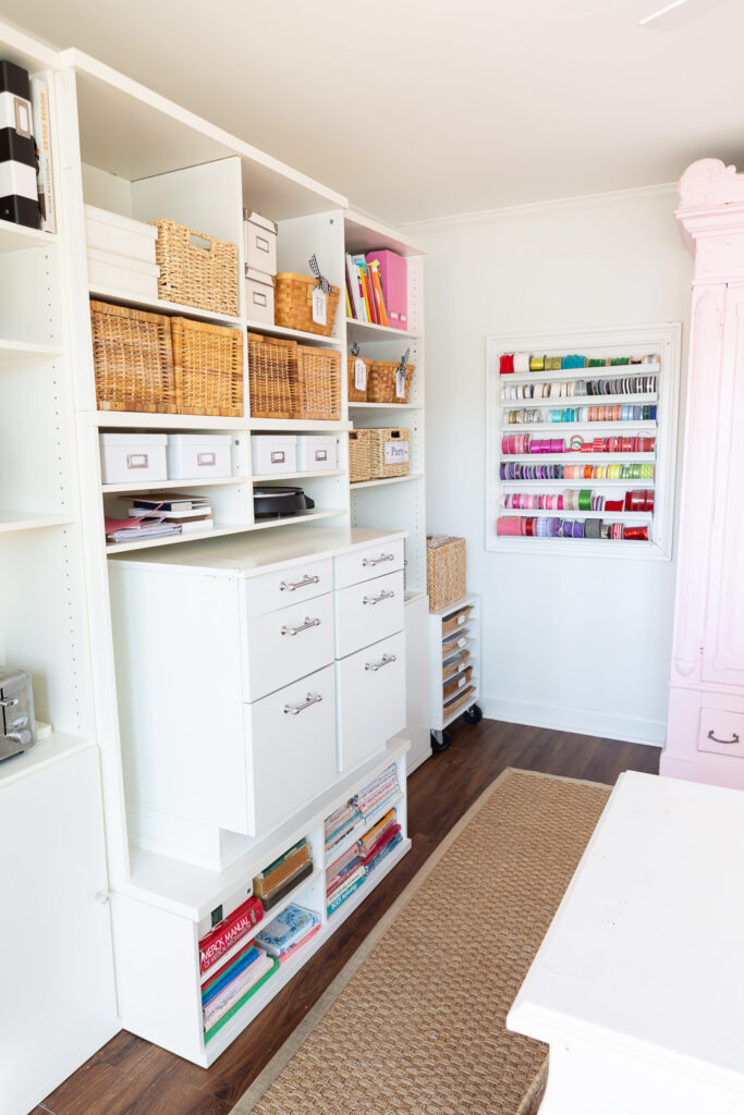 Looking at an angle of the vintage IKEA wall unit mixed with other storage units and file cabinets.