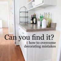 white kitchen with beadboard on side of the cabinets that was placed on wrong.