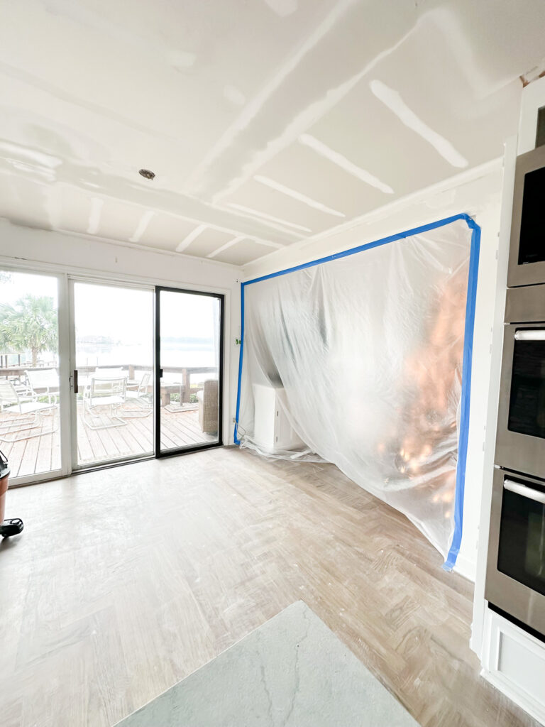 plastic taped up to keep sanding dust from other rooms when sheetrock sanding on ceiling was being done.