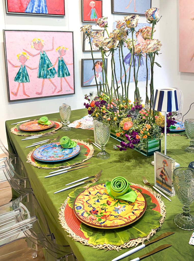 Splatter painted roses on an table centerpiece for a charity luncheon.