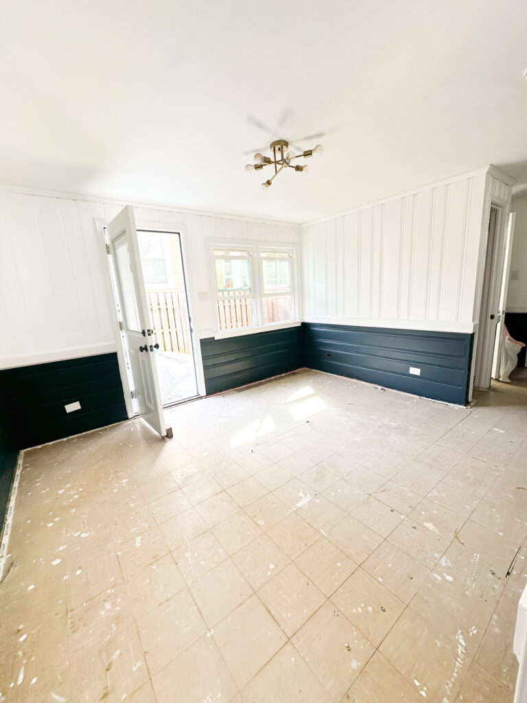 sunroom after removing yucky carpet and scrubbing floor clean.