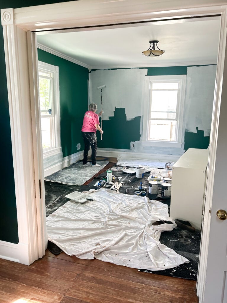 Painting light color paint over dark in a home