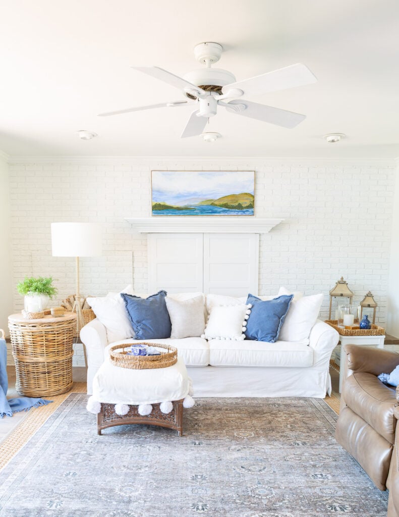 blue and white living room with a modern coastal vibe