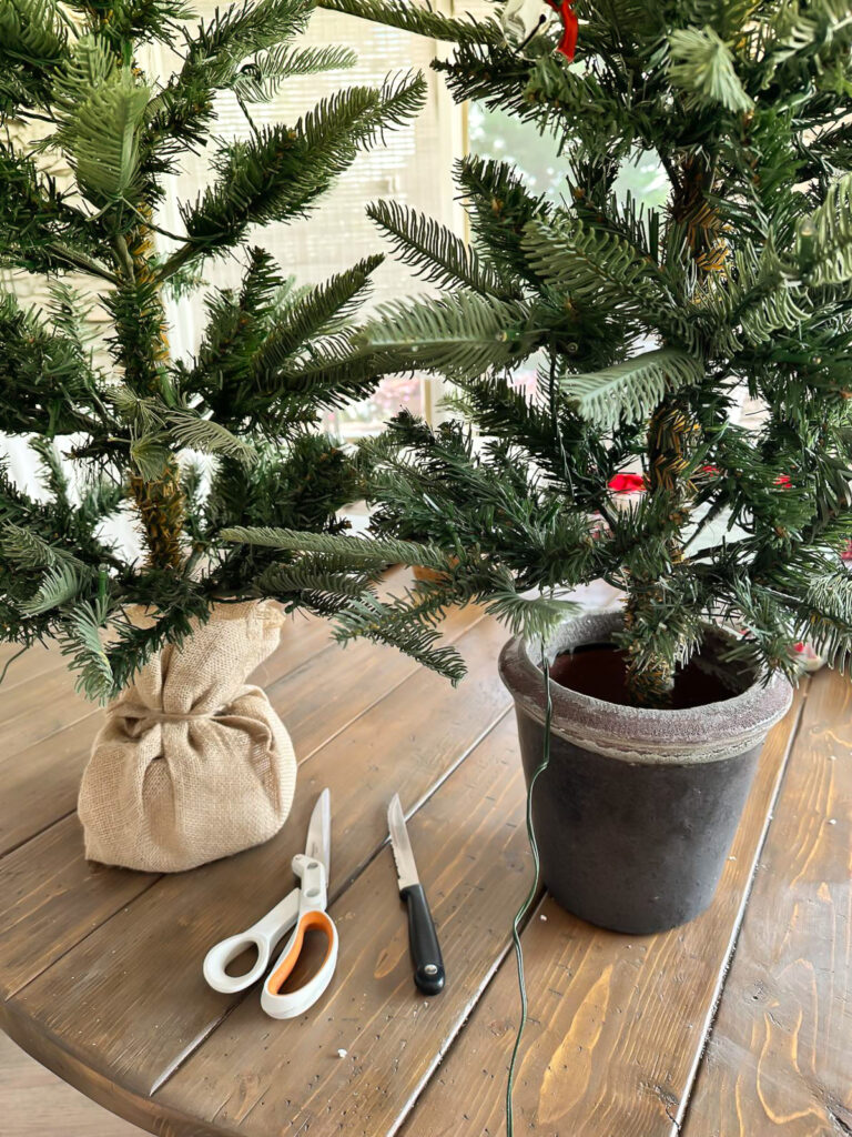 removing the burlap cover that comes on a 3 ft King of Christmas tree.