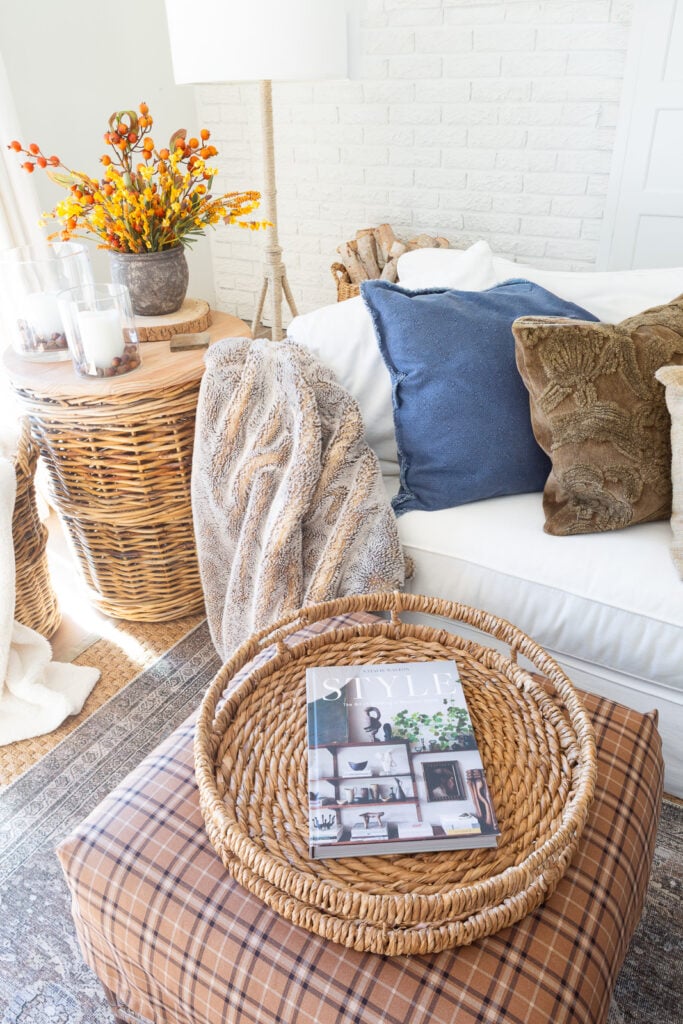 Cozy corner in a living room decorated for fall.