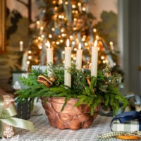 copper mold used as a Christmas candle centerpiece