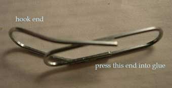 Plate-hanger made with a paper clip