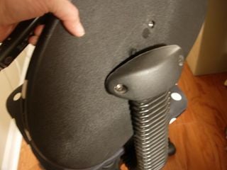 How to take the back off an office chair.
