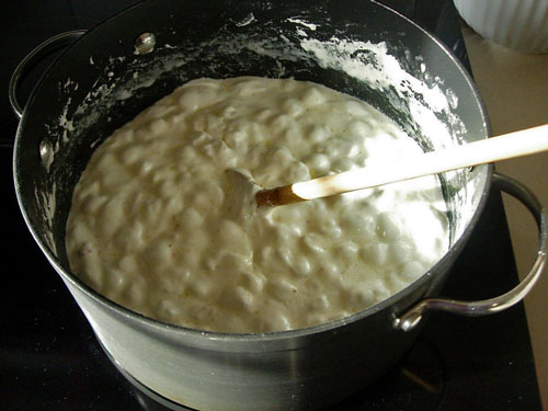 Popcorn-Cake-Marshmallow-mixture melting in pot on stove